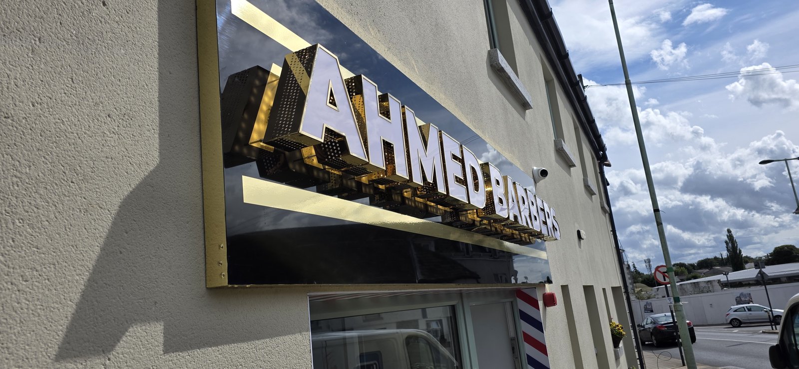 Amin Barbers built-up shopfront lettering by Shop Front Makers