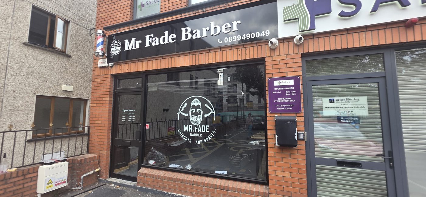 Mr Fade Barber shopfront with illuminated lettering and projecting sign by Shop Front Makers