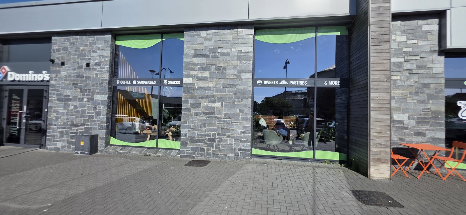 Domino's storefront window graphics by Shop Front Makers